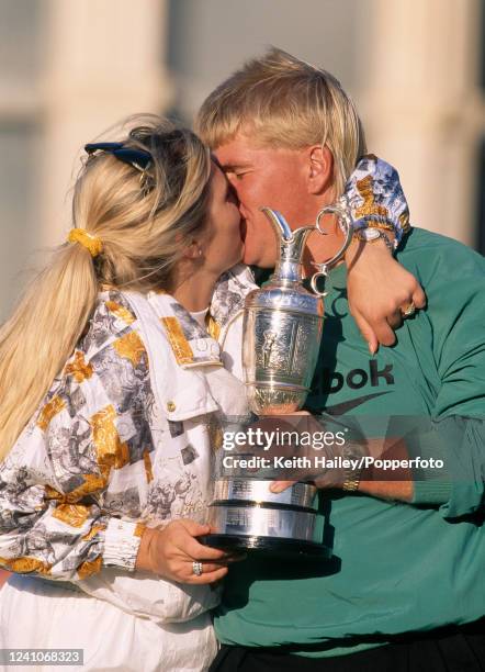 John Daly of the United States and his wife Paulette celebrate with the trophy after winning the 124th Open Championship at the Old Course at St...