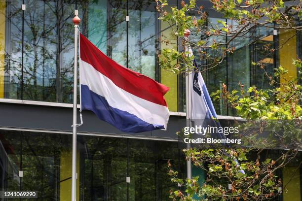 National flag flies outside the Dutch finance ministry headquarters in The Hague, Netherlands, on Wednesday, June 1, 2022. Second Sentence. The...