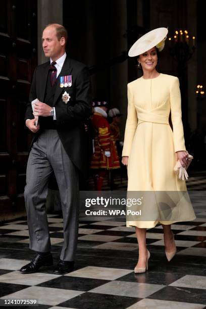 Britain's Prince William and his wife Kate the Duchess of Cambridge leave after a service of thanksgiving for the reign of Queen Elizabeth II at St...