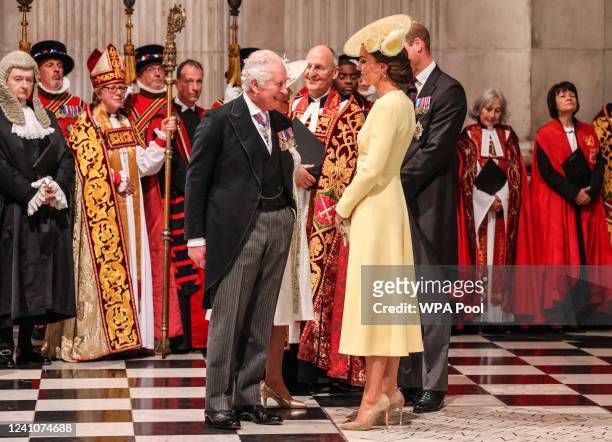 Prince William, Duke of Cambridge, and Catherine, Duchess of Cambridge talk with Prince Charles, Prince of Wales and Camilla, Duchess of Cornwall...