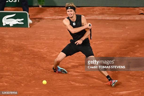 Germany's Alexander Zverev falls injured on court during his men's semi-final singles match against Spain's Rafael Nadal on day thirteen of the...