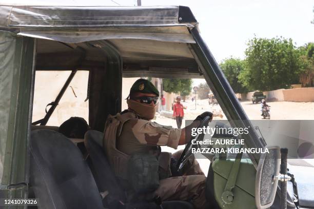 French soldier from the French Barkhane force driving a military vehicle posted in front of a school in Faya-Largeau, northern Chad, on June 2, 2022....
