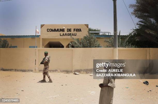 French soldier from the Barkhane force patrols in front of the town hall of Faya-Largeau, in northern Chad, on June 2, 2022. The Barkhane detachment...