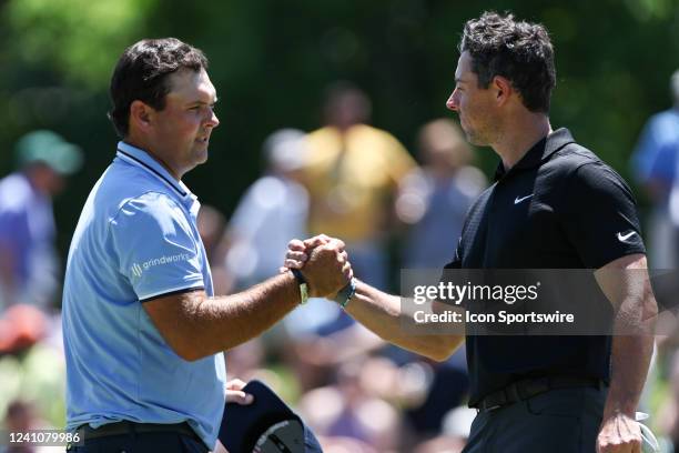 Patrick Reed shakes hands with Rory McIlroy after their second round of the Memorial Tournament presented by Workday on June 3 at the Muirfield...