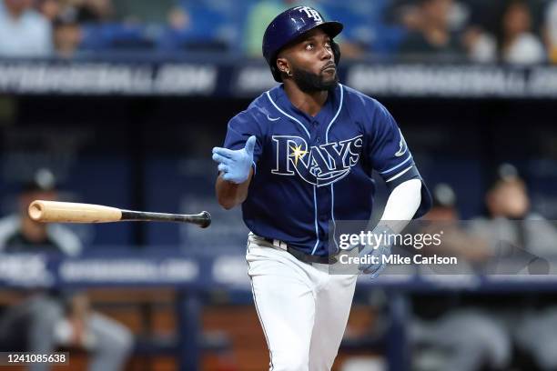 Randy Arozarena of the Tampa Bay Rays watches his home run against the Chicago White Sox during the first inning of a baseball game at Tropicana...