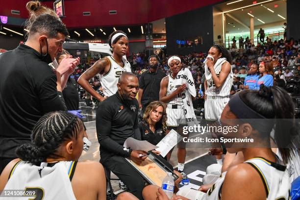 Chicago head coach James Wade talks with his team in a time-out during the WNBA game between the Chicago Sky and the Atlanta Dream on June 3rd, 2022...