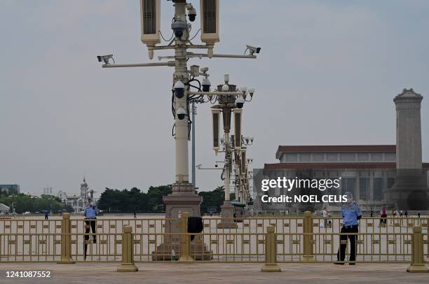 Policemen stand guard in front of the Tiananmen Square during the 33rd anniversary of the June 4, 1989 crackdown on pro-democracy protests, in...