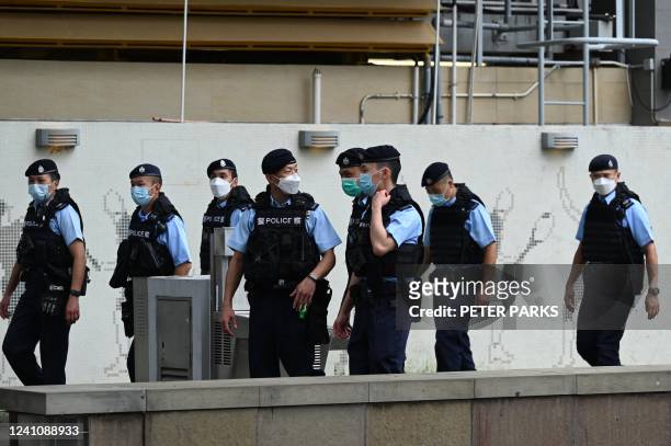 Police patrol an entry to Victoria Park in the Causeway Bay district of Hong Kong on June 4, 2022 after closing the venue where Hong Kong people...