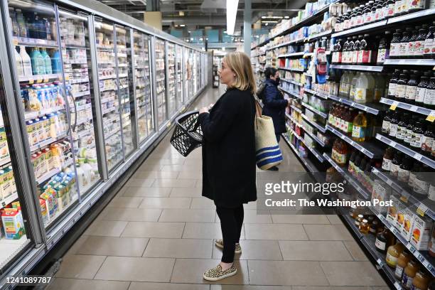 Kelly Hayes shops at Whole Foods Market in the Tenleytown neighborhood on Thursday April 28, 2022 in Washington, DC. As inflation has risen in the...