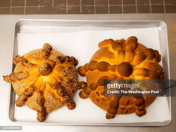 Pan de muerto after coming out of the oven at La Estrella Bakery in Tucson, Arizona on October 19, 2021. La Estrella makes Pan de Muerto for Dia de...