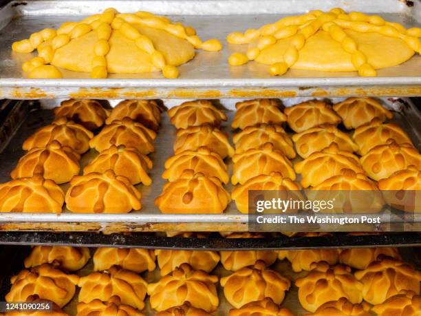 Pan de muerto on the racks at La Estrella Bakery in Tucson, Arizona on October 19, 2021. La Estrella makes Pan de Muerto for Dia de Los Muertos