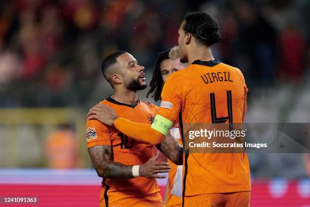 Memphis Depay of Holland, Virgil van Dijk of Holland celebrating the victory during the UEFA Nations league match between Belgium v Holland at the...