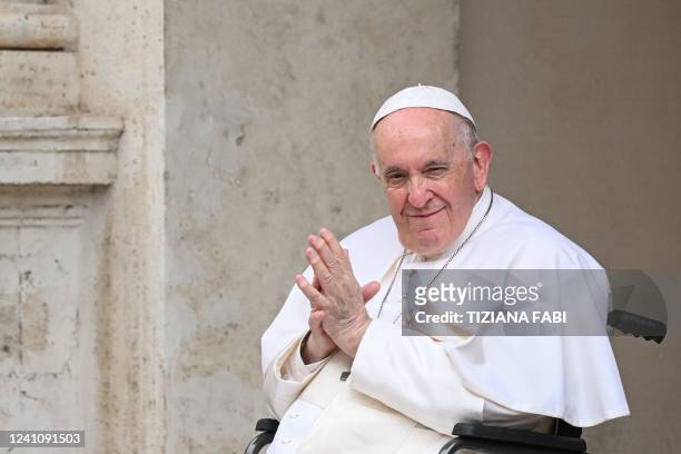 Pope Francis, seated in a wheelchair following knee treatment, presides over "The Cortile dei Bambini" encounter with children coming from all over...
