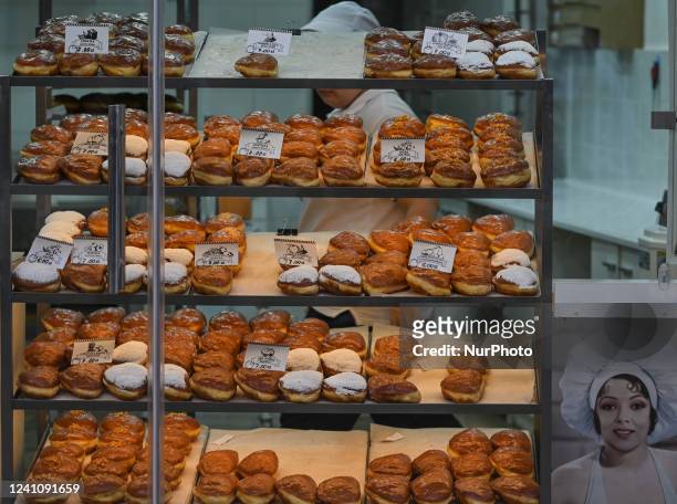 Stand with Polish doughnuts for sale in Krakow's city center. On Saturday, June 04 2022, in Krakow, Poland.