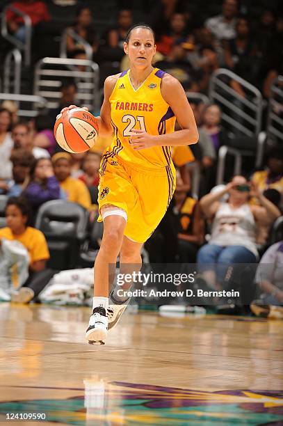 Ticha Penicheiro of the Los Angeles Sparks moves the ball against the Seattle Storm at Staples Center on August 30, 2011 in Los Angeles, California....