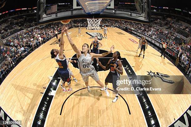 Ruth Riley of the San Antonio Silver Stars lays up the ball against the Connecticut Sun at AT&T Center on August 30, 2011 in San Antonio, Texas. NOTE...