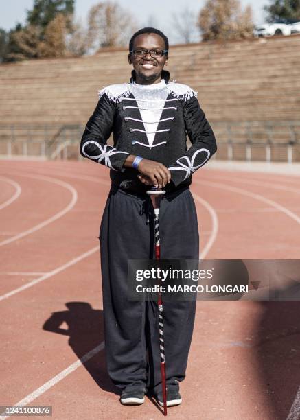 South African male majorette Musa Ketsekele poses before competing during a Federation of Dance Drill, Cheerleading and Majorette Sport South Africa...