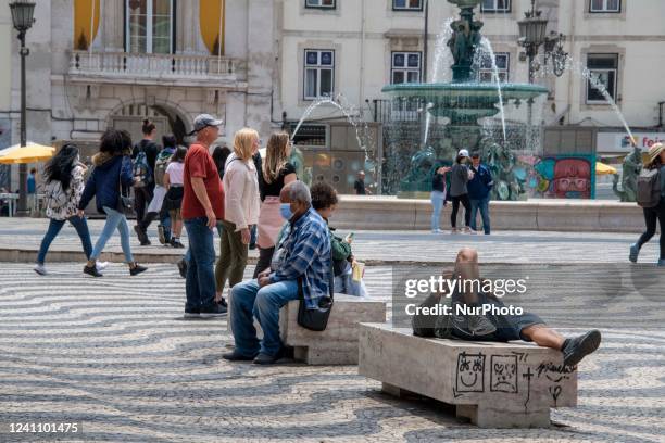 People are seen walking and resting near Rossio Square. Lisbon, June 03, 2022. Portugal has already passed the peak of this COVID-19 pandemic wave,...