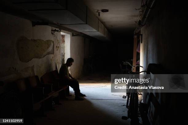 Local resident sits in a school's bomb shelter on June 4, 2022 in Velyka Novosilka, Ukraine. As Russia's assault on Ukraine has passed the 100 day...