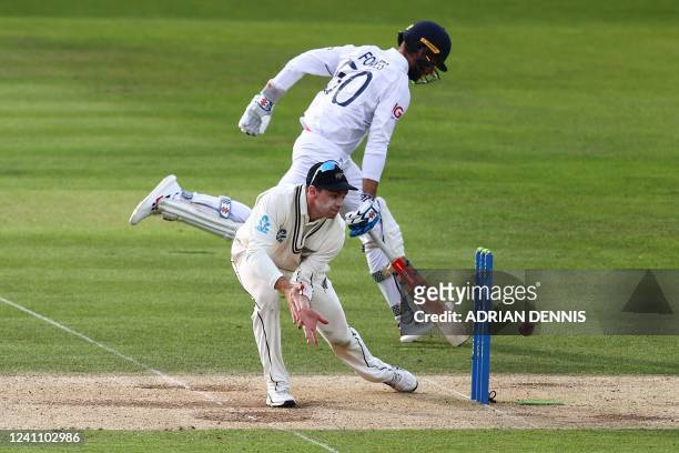 England's Ben Foakes reaches his crease safe after running between the wickets on the third day of the first cricket Test match between England and...