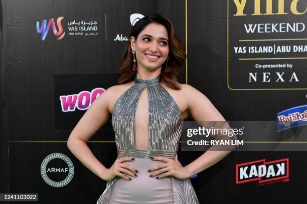 Bollywood actress, Tamannaah arrives for the green carpet of 22nd edition of the International Indian Film Academy Awards in Abu Dhabi on June 4,...
