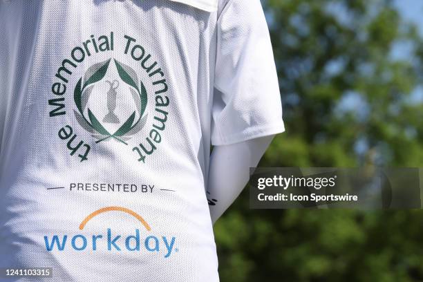 Memorial Tournament logo seen on the bib of Rickie Fowler's caddy, Joe Skovron, during the third round of the Memorial Tournament presented by...