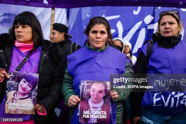 Mother with a photo of her daughter Mili Orieta who was murdered as a result of her partner's femicide during the demonstration. Seven years after...