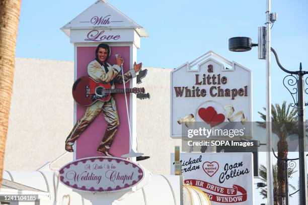 Replica of Elvis Presley is displayed on a sign in front of the Little White Chapel. Authentic Brands Group, which owns Elvis Presley's intellectual...