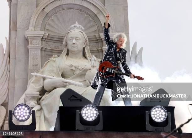 British guitarist Brian May performs at the Platinum Party at Buckingham Palace on June 4, 2022 as part of Queen Elizabeth II's platinum jubilee...