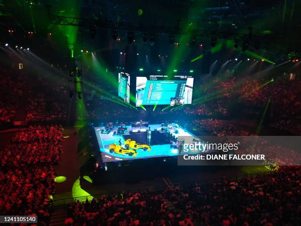 People attend the Trackmania Cup final, an electronic sports competition on a racing game, on June 4, 2022 at the Accor Arena in Paris.