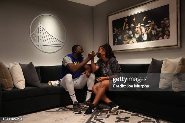 Draymond Green of the Golden State Warriors speaks to Ros Gold-Onwude during practice and media availability as part of the 2022 NBA Finals on June...
