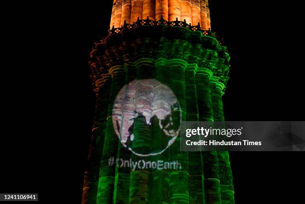 View of Qutub Minar illuminated with 3D projections on the eve of World Environment Day on June 4, 2022 in New Delhi, India. Frankie the Dino took...