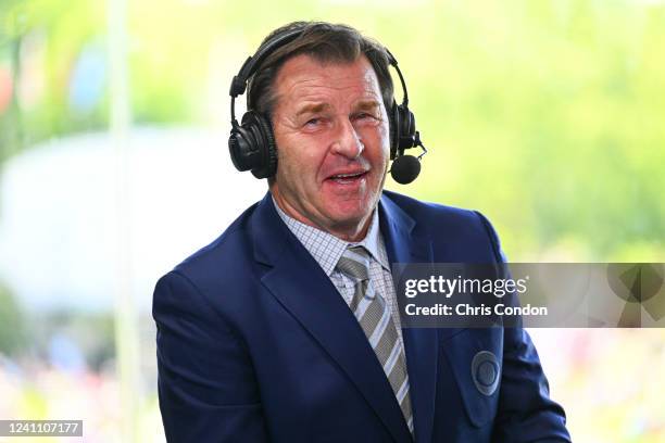 Sir Nick Faldo of CBS Sports in the 18th hole booth during the third round of the Memorial Tournament presented by Workday at Muirfield Village Golf...