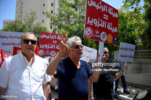 Demonstration is held by a number of political parties in front of the Tunisian Independent High Authority for Elections building at Lac 2 in Tunis,...