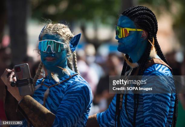 Two men dressed as characters of the movie 'Avatar' take part in a demonstration in favor of LGTBI+ people's rights, as part of the LGTBI+ Pride...