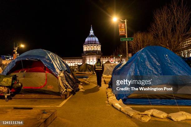 Urban Alchemys Rodney Wrice patrols a homeless tent village a block away from San Franciscos City Hall in the Tenderloin neighborhood of San...