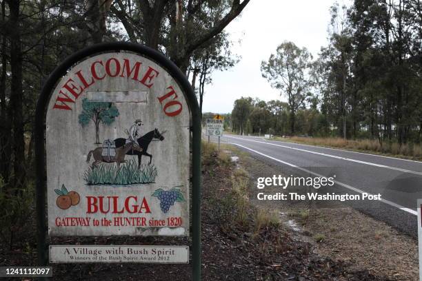 Sign welcoming travelers to Bulga, a town near Singleton, Australia, that is now almost surrounded by open-cut mines.