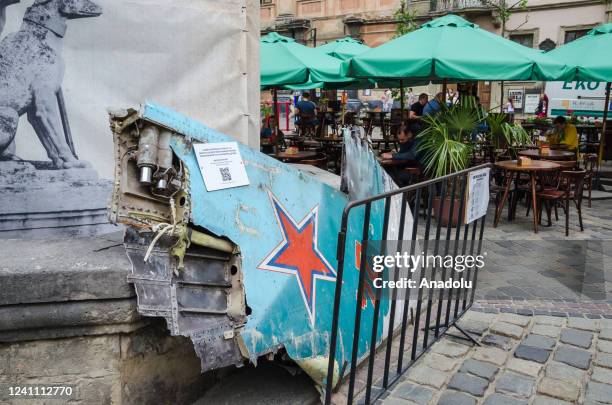 Wing from a downed Russian plane near a hidden fountain in Lviv, Ukraine on June 4, 2022.