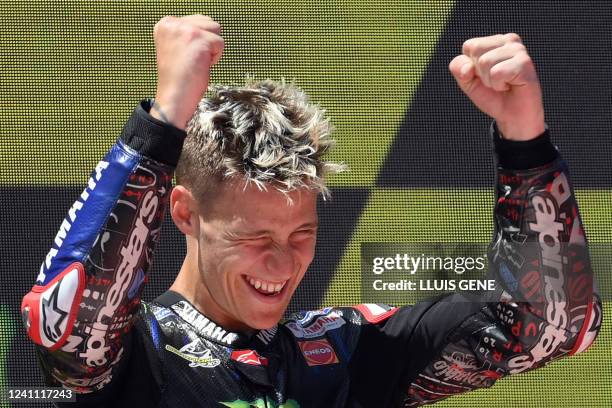 Yamaha French rider Fabio Quartararo celebrates on the podium after winning the Moto Grand Prix de Catalunya at the Circuit de Catalunya on June 5,...