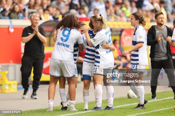 Antonia-Johanna Halverkamps of Duisburg celebrates with Melissa Ugochukwu after scoring at the 2. Frauen-Bundesliga match between MSV Duisburg and RB...