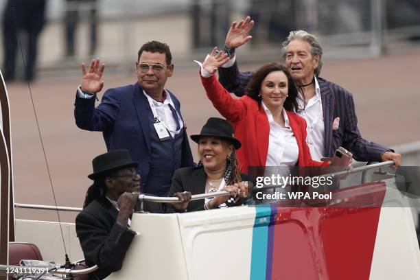 English actor Craig Charles, English ballroom dancer Shirley Ballas and English actor Patrick Mower ride on an open top double-decker bus during the...