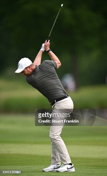 Wil Besseling of Netherlands plays his second shot at the 16th hole during Day Four of the Porsche European Open at Green Eagle Golf Course on June...