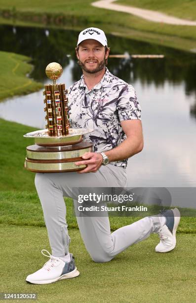 Kalle Samooja of Finland poses with the trophy as he finishes his round -8 for the day and wins the Porsche European Open at Green Eagle Golf Course...