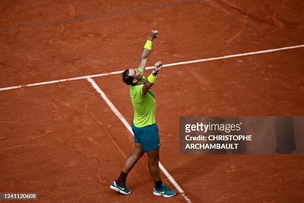 Spain's Rafael Nadal celebrates after winning against Norway's Casper Ruud at the end of their men's singles final match on day fifteen of the...