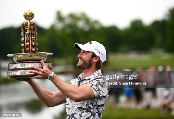 Kalle Samooja of Finland poses with the trophy as he finishes his round -8 for the day and wins the Porsche European Open at Green Eagle Golf Course...