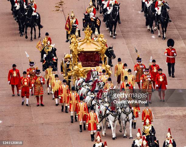 The original golden coronation carriage with a hologram of the Queen is seen during the Platinum Pageant on June 05, 2022 in London, England. The...