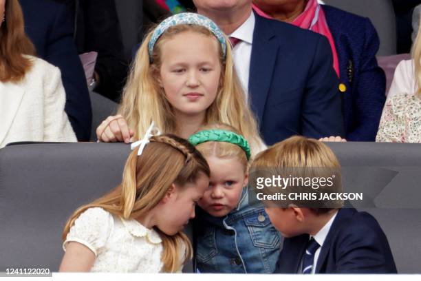 Savannah Phillips , Mia Tindall, Britain's Princess Charlotte of Cambridge and Britain's Prince George of Cambridge chat during the Platinum Pageant...