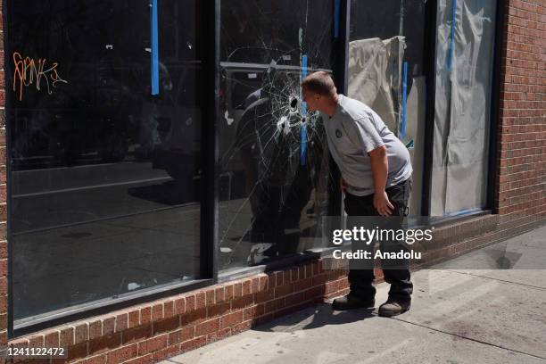 Bullet holes on a window are seen in the South Street area of Philadelphia, United States on June 5, 2022. According to the initial reports, multiple...