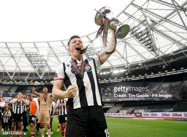 Grimsby Towns Harry Clifton celebrates with the Vanarama National League Final trophy after their sides victory during the Vanarama National League...