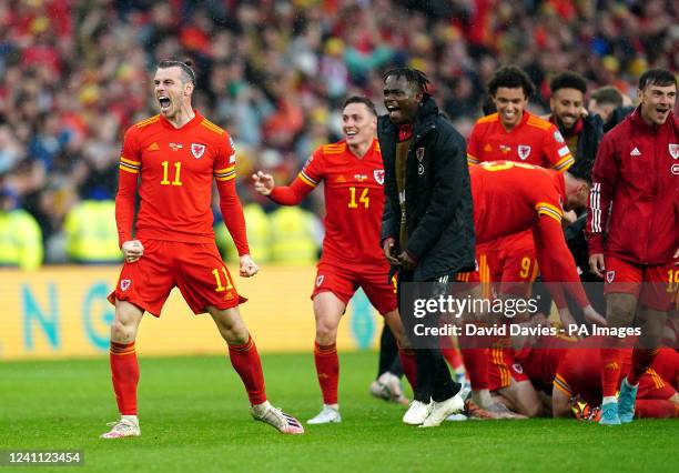Wales' Gareth Bale celebrates with team-mates after qualifying for the Qatar World Cup following victory in the FIFA World Cup 2022 Qualifier...